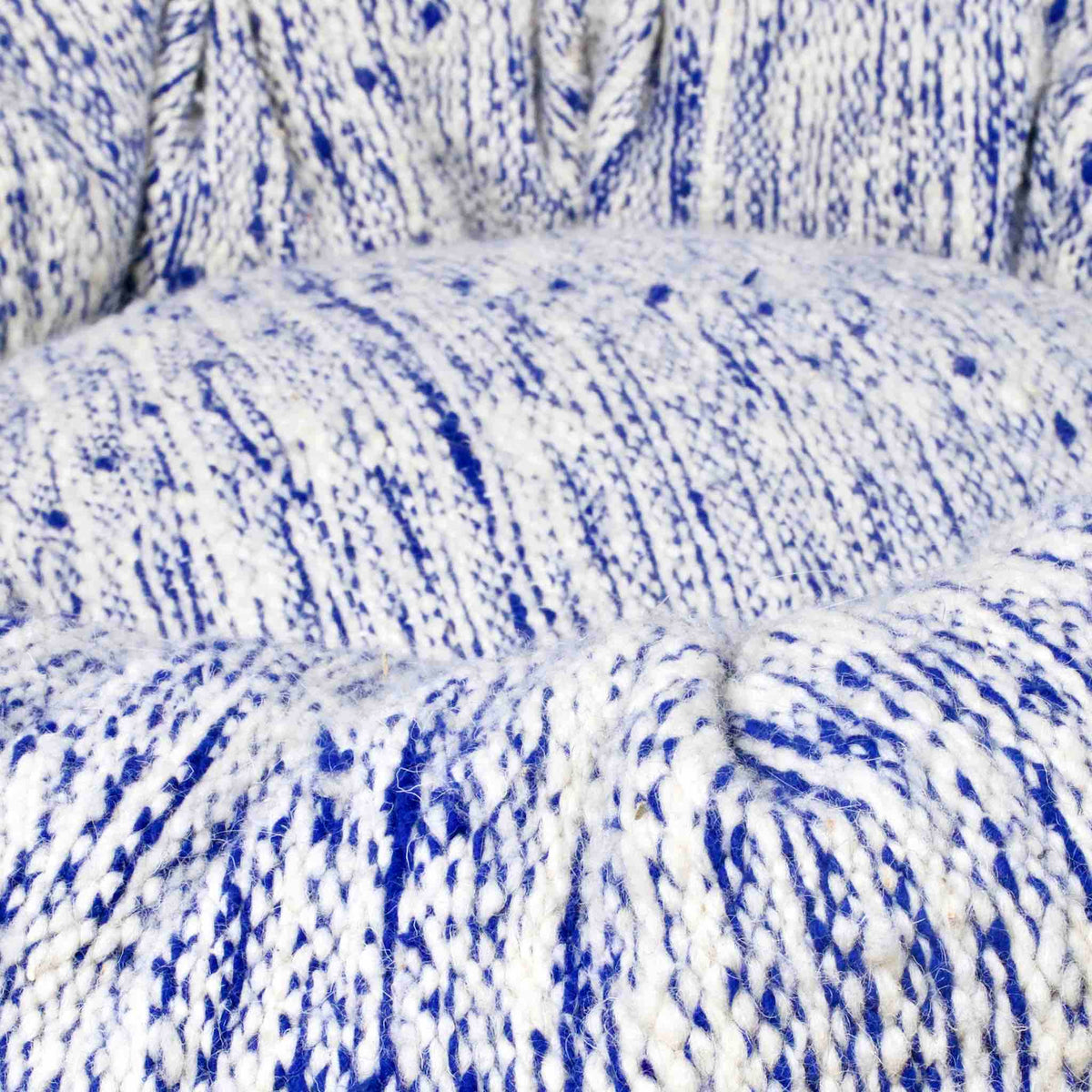 Close up zoom on blue and white Kilim Fluffikon dog bed.