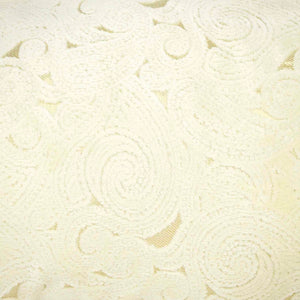 Zoom on beige velvet fabric of a Fluffikon oversized lumbar pillow.