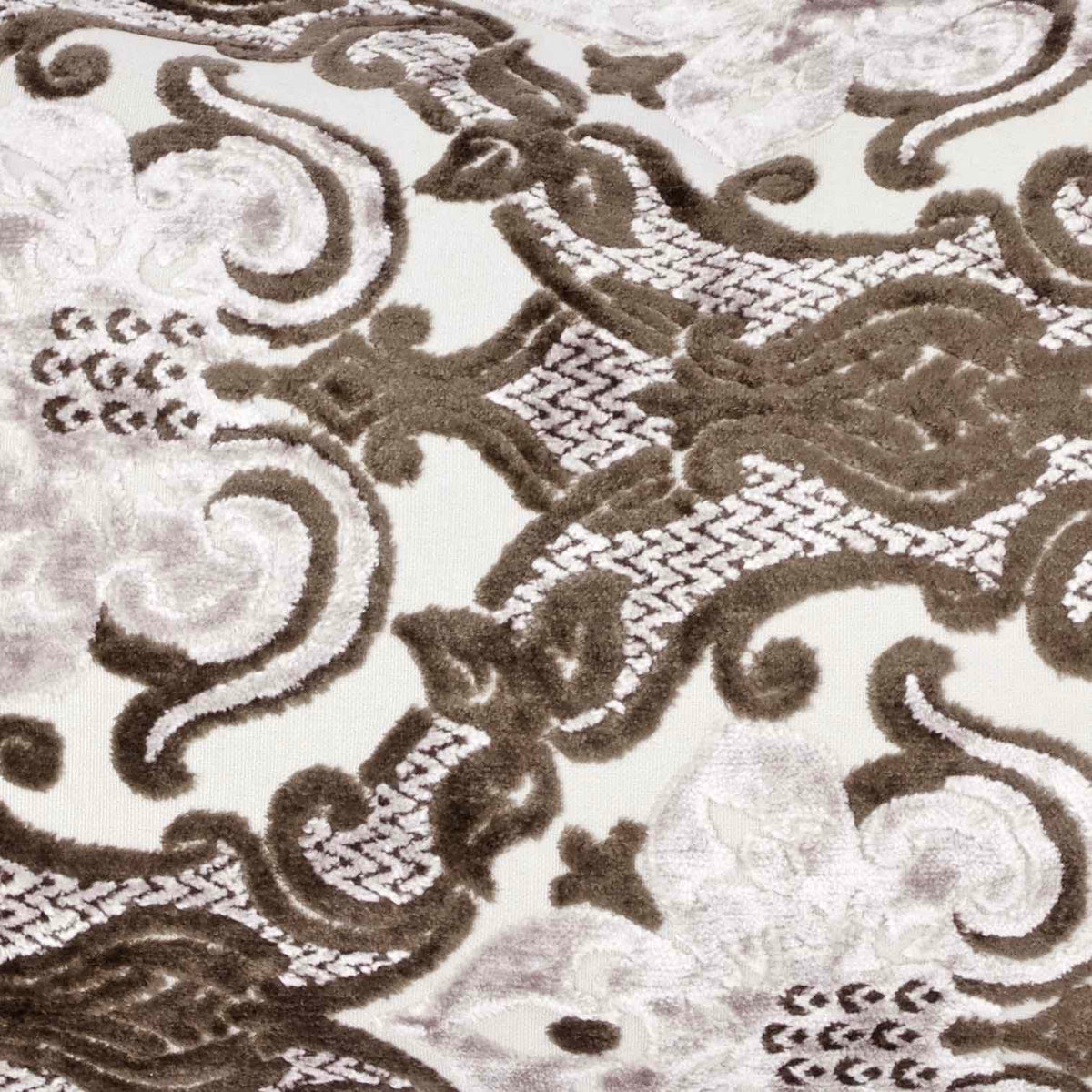Zoom on large couch pillow with brown beige velvet.